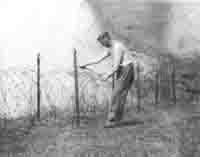 C. Couldry doing a bit more wiring&middot;on the 13th Green?